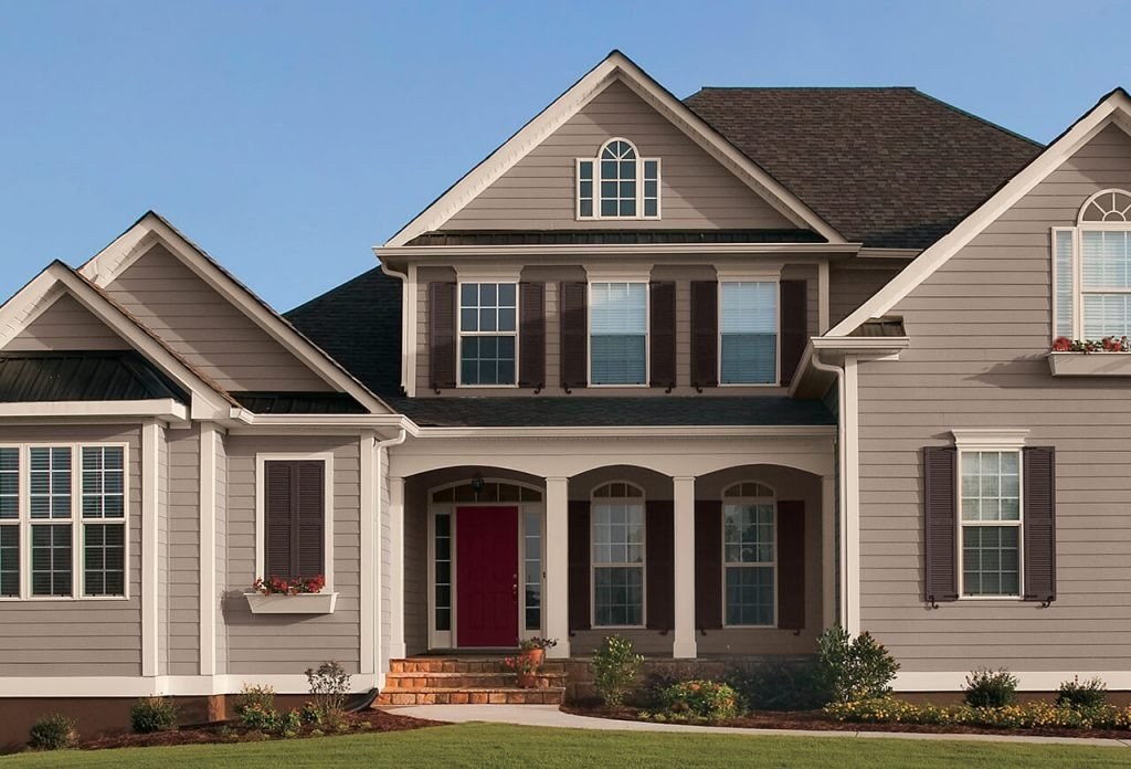 Two-story house exterior with a fresh, clean finish